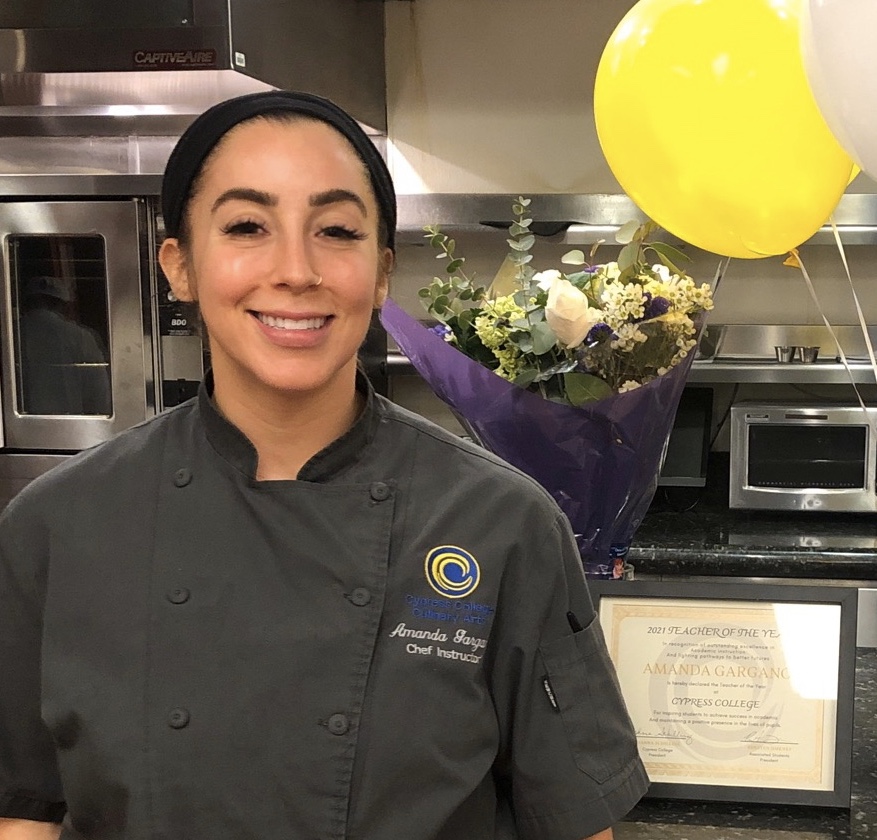Culinary Instructor Amanda Gargano with flowers and balloons