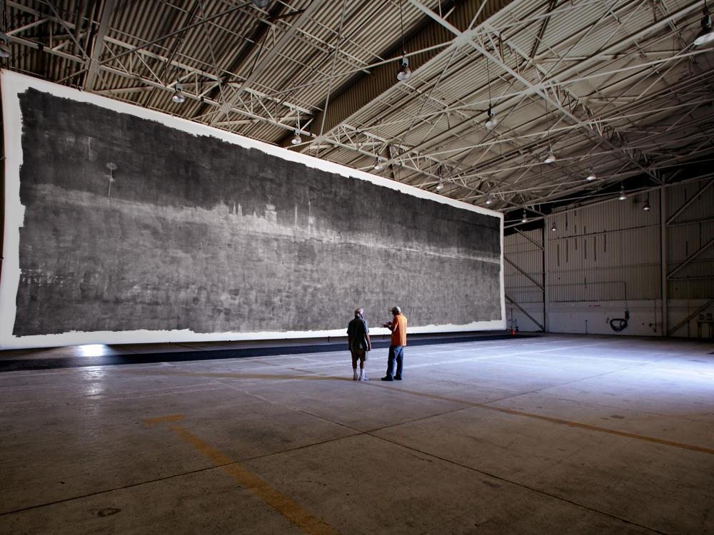 The Great Picture, a 375-square-foot photograph, hangs in an abandoned airplane hangar. Courtesy of the Smithsonian.